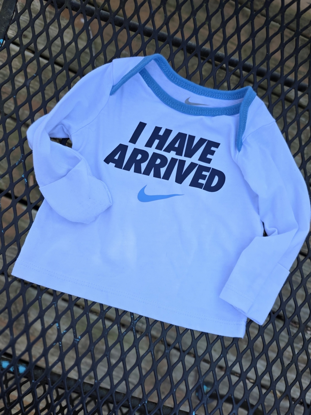 Nike White Long Sleeve Tee with Teal Trim and Bold Graphic